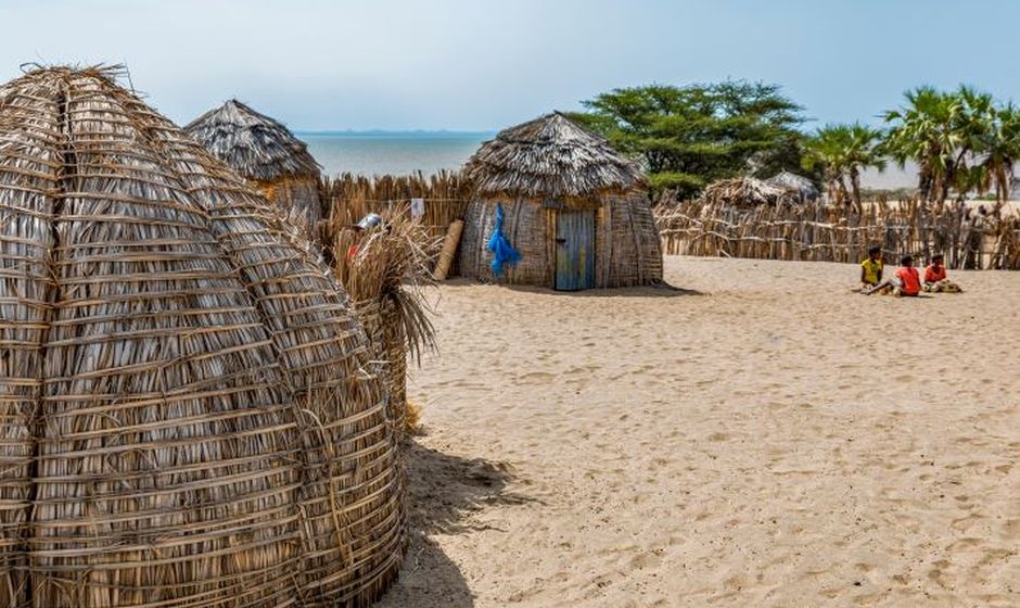 Beach, huts and people at Lodwar, Kenya